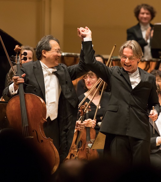 Yo-Yo Ma and Esa-Pekka Salonen acknowledge applause following the world premiere of Salonen's Cello Concerto with the Chicago Symphony Orchestra Thursday night. Photo: Anne Ryan