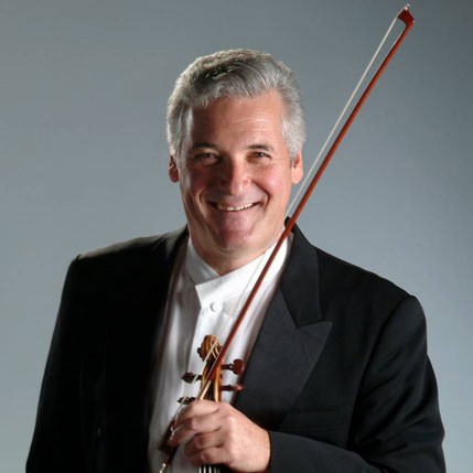 Pinchas Zukerman conducted and performed as soloist with the Royal Philharmonic Orchestra Wednesday night at the Harris Theater.