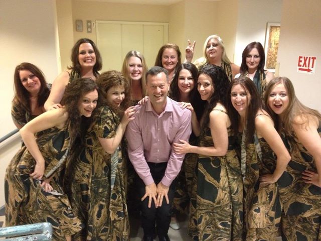 Lyric Opera chorus master Michael Black backstage with the "Parsi-gals"---chorus members in costume for "Parsifal."