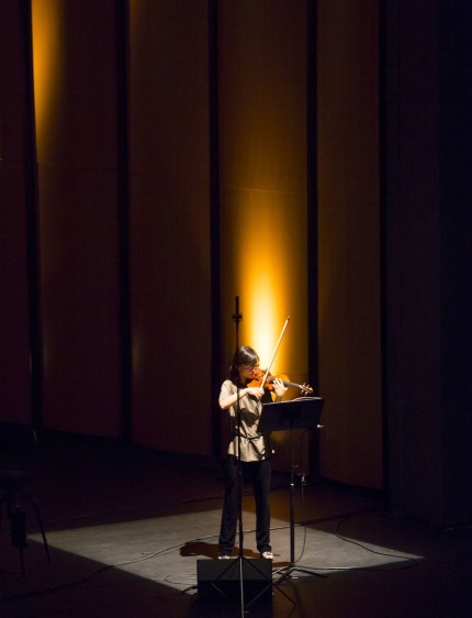 Violinist Qing Hou performed Michael Gordon's "The Light Is Calling" at Monday's MusicNOW concert at the Harris Theater. Photo: Todd Rosenberg 