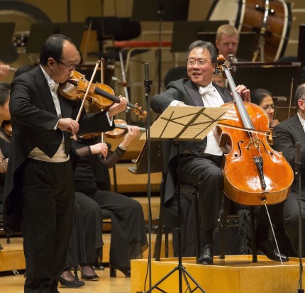 Robert Chen and Yo-Yo Ma perform Saint-Saëns’ "La muse et le poete" with Charles Dutoit and the Chicago Symphony Orchestra Thursday night. Photo: Todd Rosenberg 