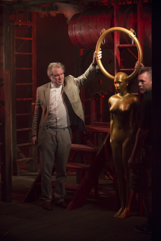 Director David Pountney (left) with a stagehand and friend at a tech rehearsal for Wagner's "Das Rheingold" at Lyric Opera. Photo: Michael Brosilow.