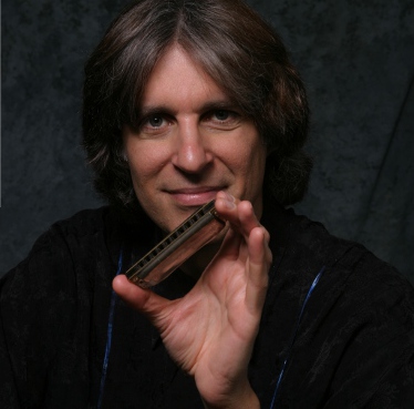 poser-harmonica player Howard Levy teamed up with the Rembrandt Chamber Players for their 25th season opener Sunday in Evanston.