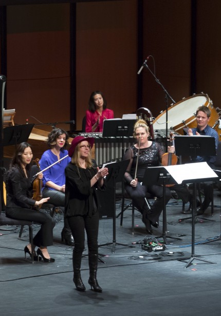 Composer Anna Clyne acknowledges applause after the world premiere of her "Postponeless Creature" at Monday's MusicNOW concert at the Harris Theater. Photo: Todd Rosenberg