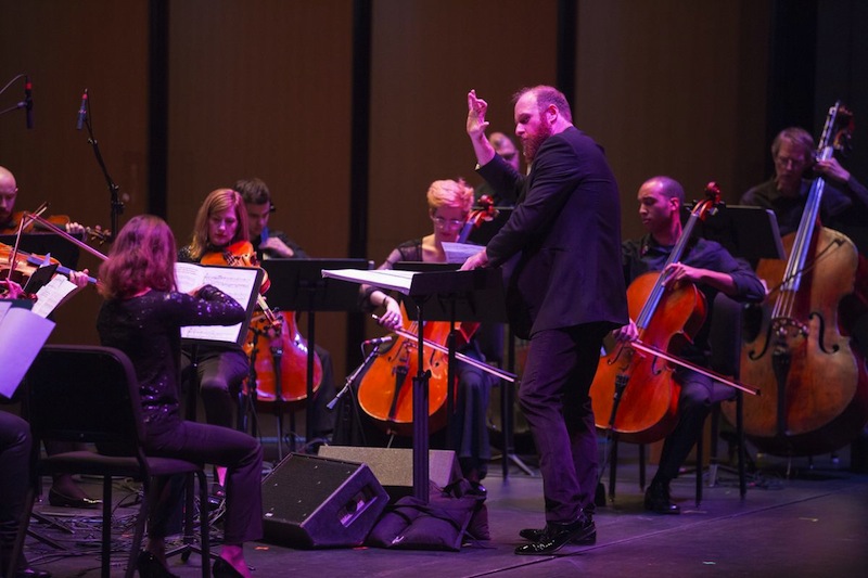 Christopher Rountree conducted Ted Hearne's "Law of Mosaics" at the MusicNOW concert Monday night at the Harris Theater. Photo: Todd Rosenberg