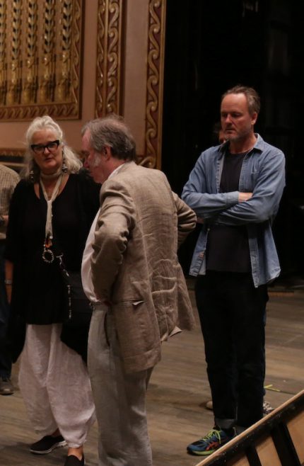 Costume designer Marie-Jeanne Lecca, director Pountney and set designer Robert Innes Hopkins confer during a rehearsal of "Das Rheingold." Photo: Andrew Cioffi