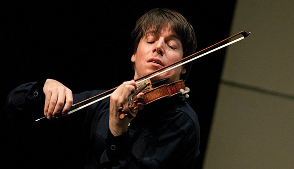 Joshua Bell performed as soloist and conductor with the Academy of St. Martin in the Fields Saturday night at the Harris Theater